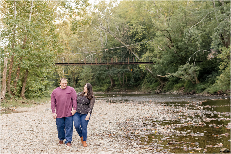 Fall engagement portraits taken at the swinging bridge at Patapsco State Park in Elkridge, Maryland.